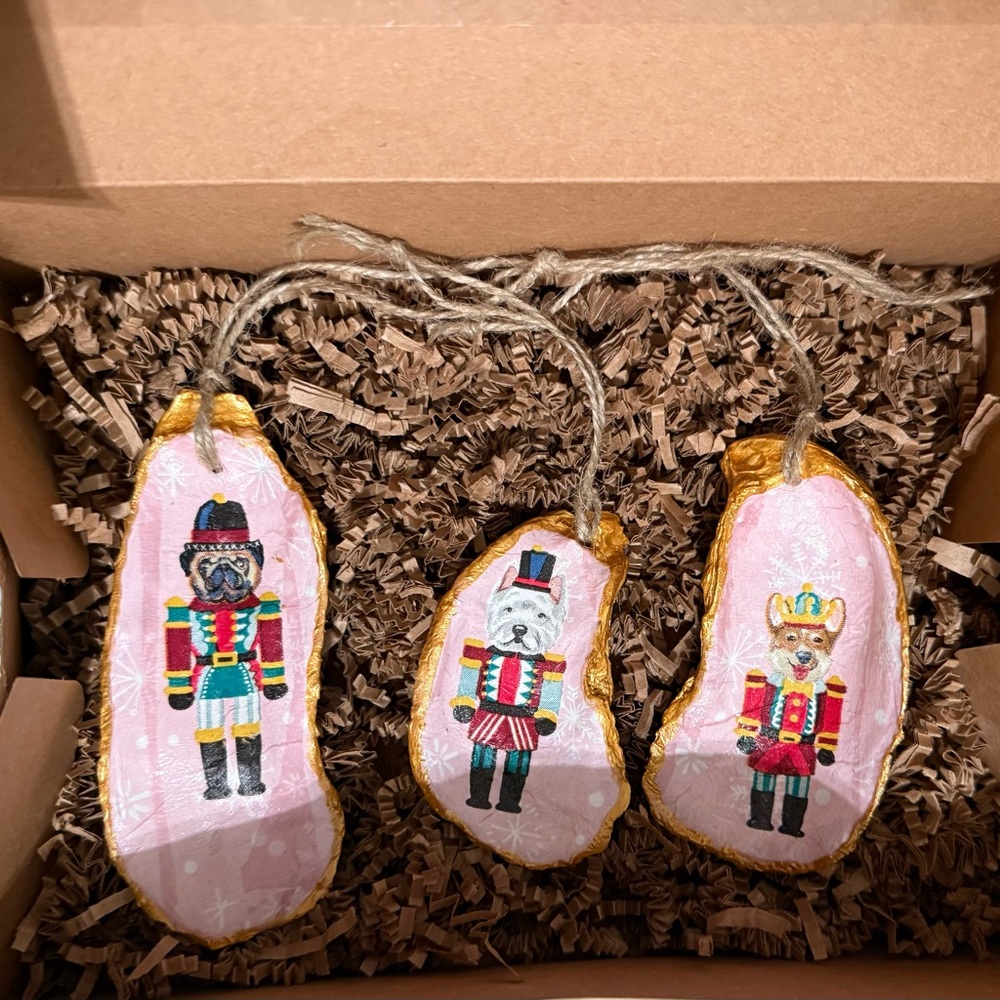 Set of 3 hand crafted oyster shell ornaments.